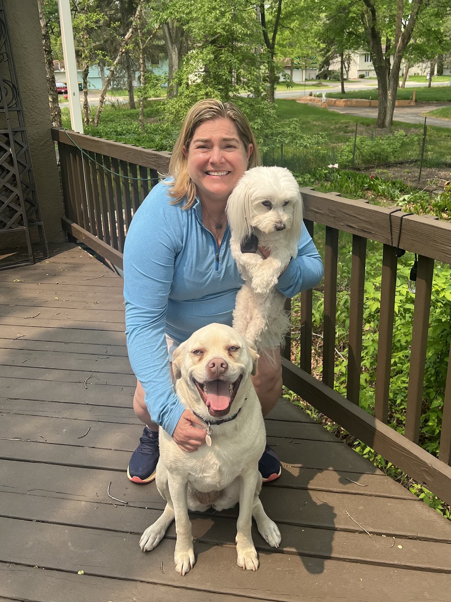 A.M sold her condo with the Berg Larsen Group team of realtors, here she is with her two dogs on a sunny day.